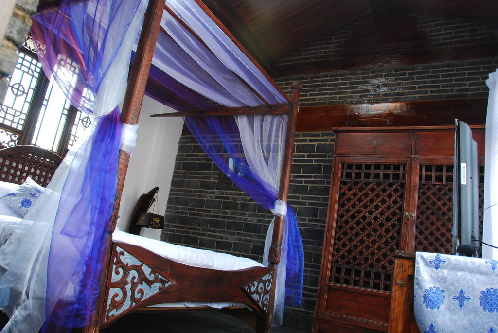 Lazy Tiger Inn Лицзян Номер фото